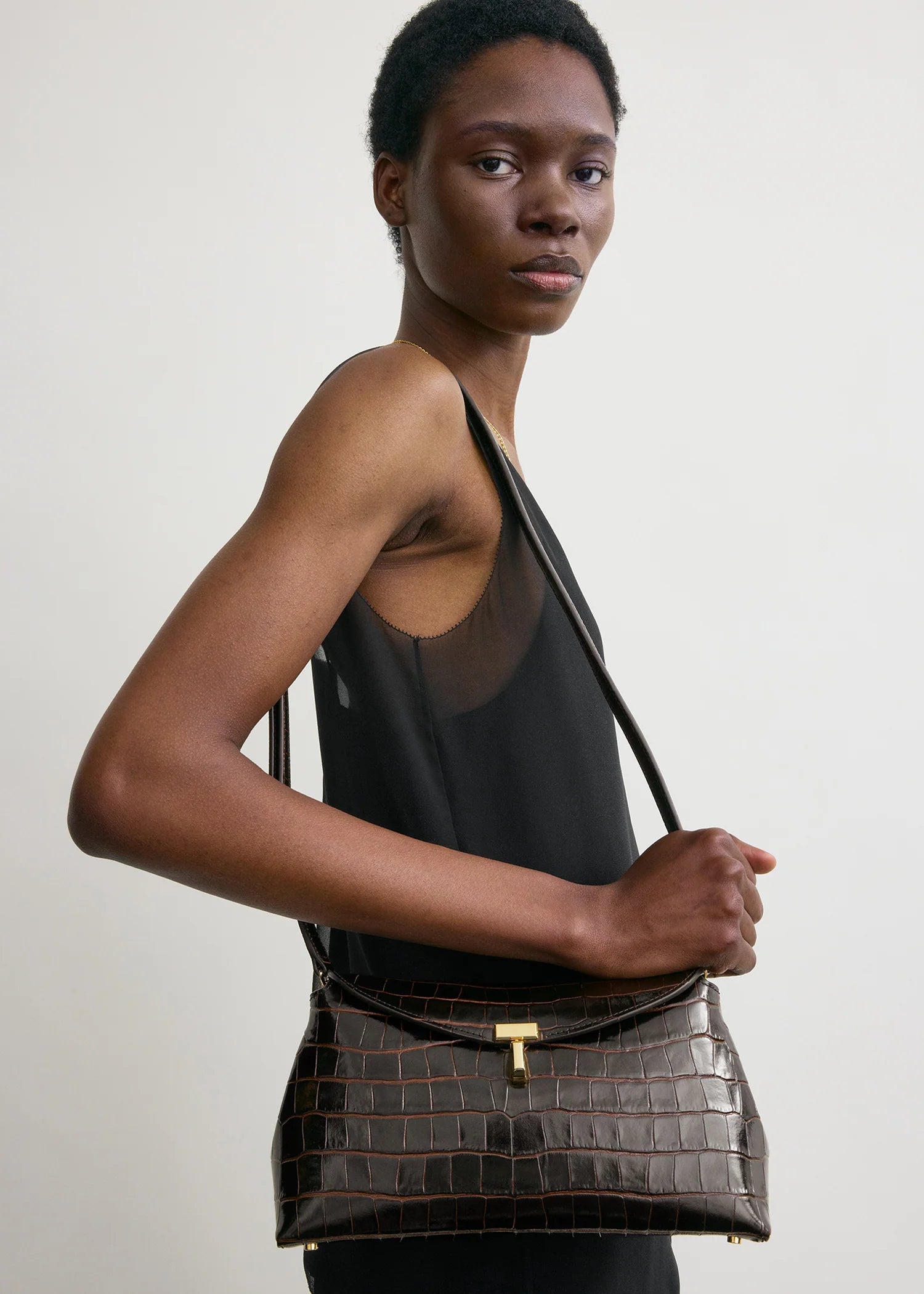 T-Lock Croco-Embossed Clutch