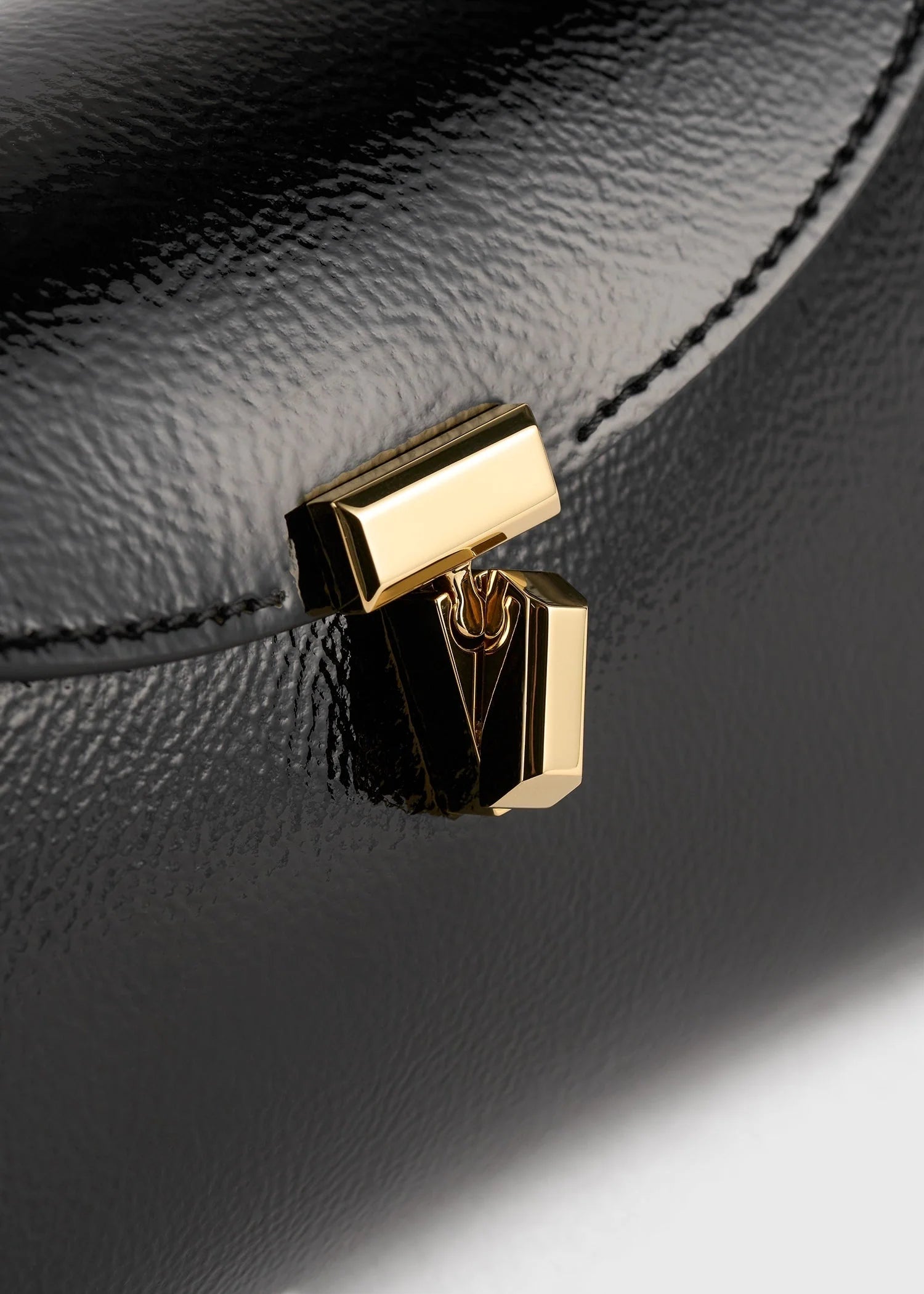Mini T-Lock Naplack Clutch