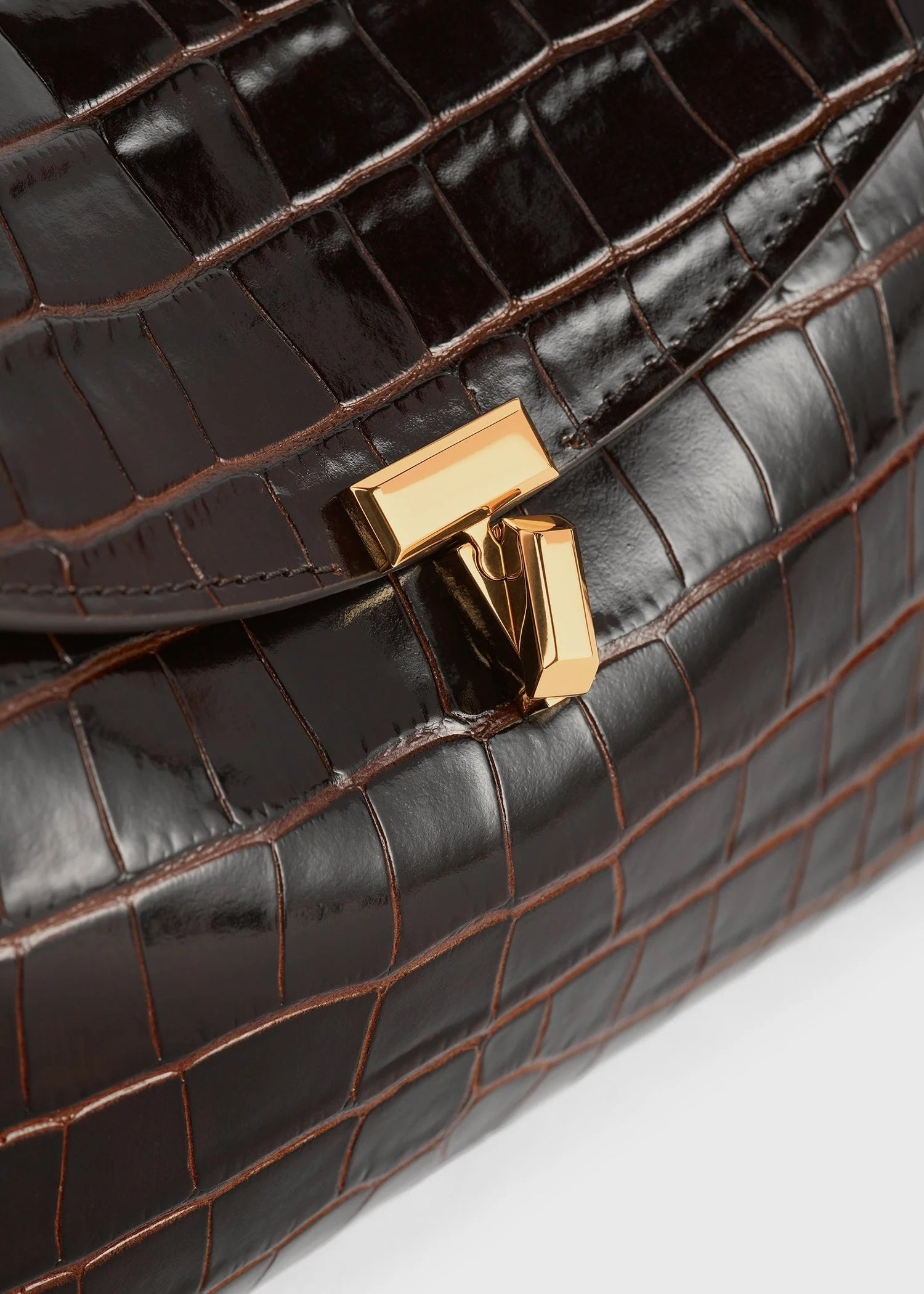 T-Lock Croco-Embossed Clutch